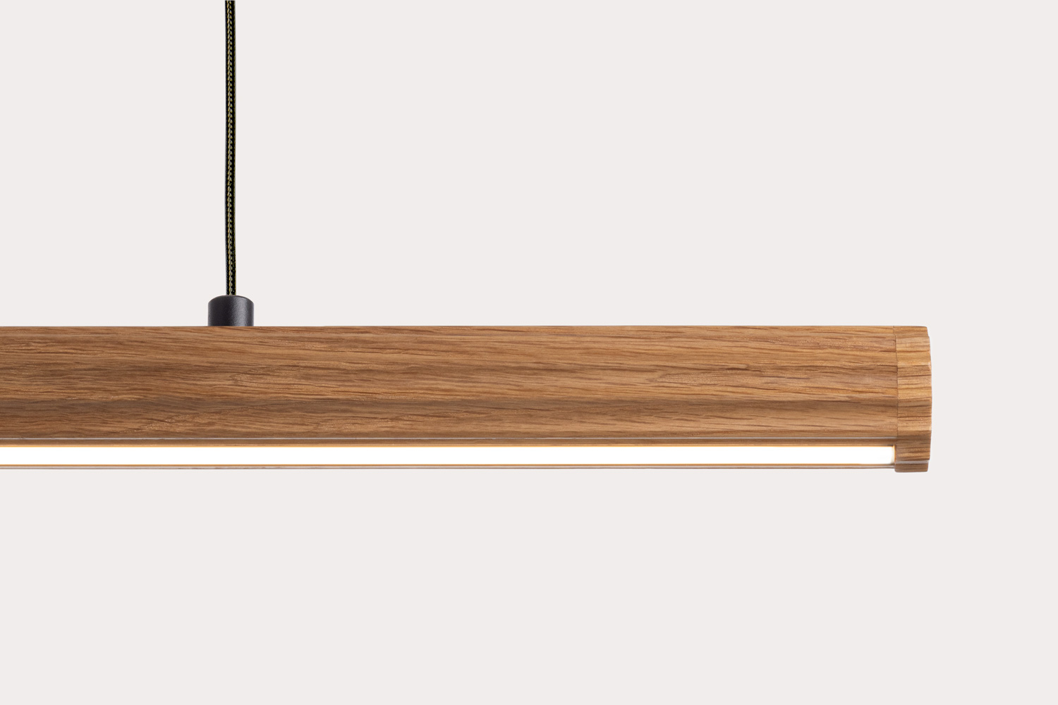 Fluted Roller Pendant shown in American Oak